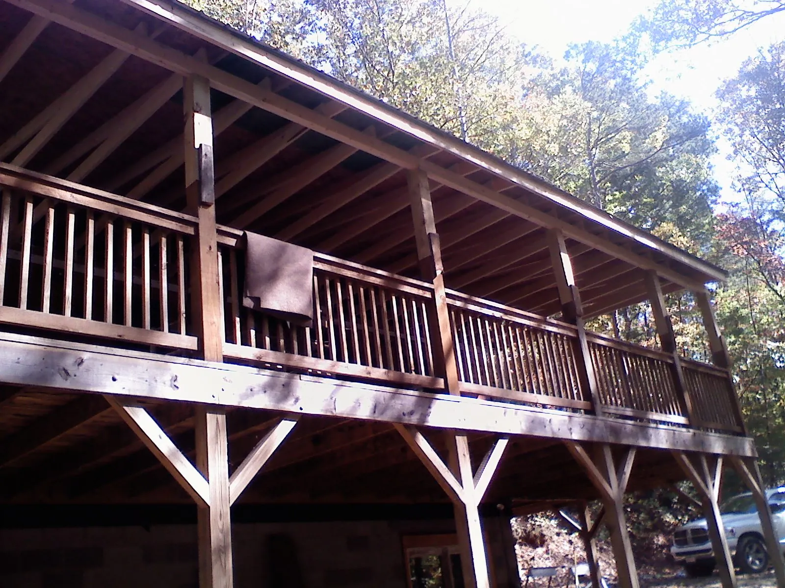 Timber framing under a new elevated porch and deck — Roof Leak Repair in Stormville by Roofing Brothers